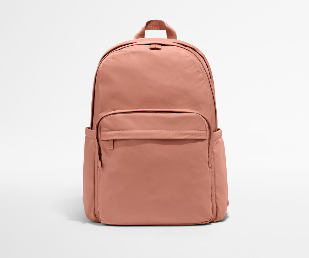 Away Large Featherlight Backpack in Clay Pink