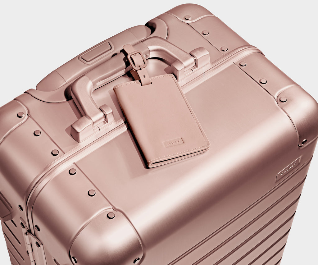 Away The Bigger Carry-On: Aluminum Edition Suitcase - Rose Gold (with USB charger)