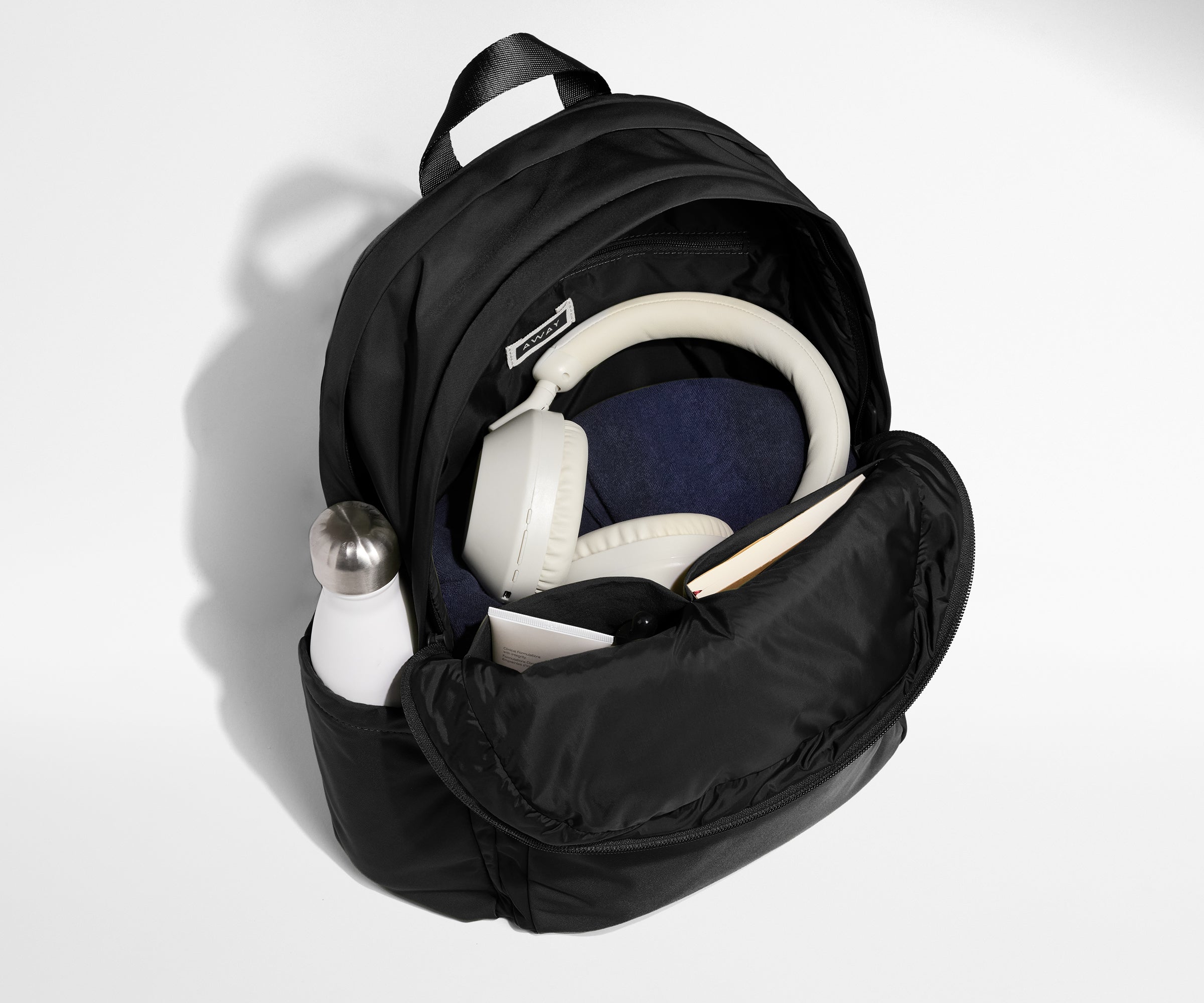 Away Large Featherlight Backpack in Jet Black