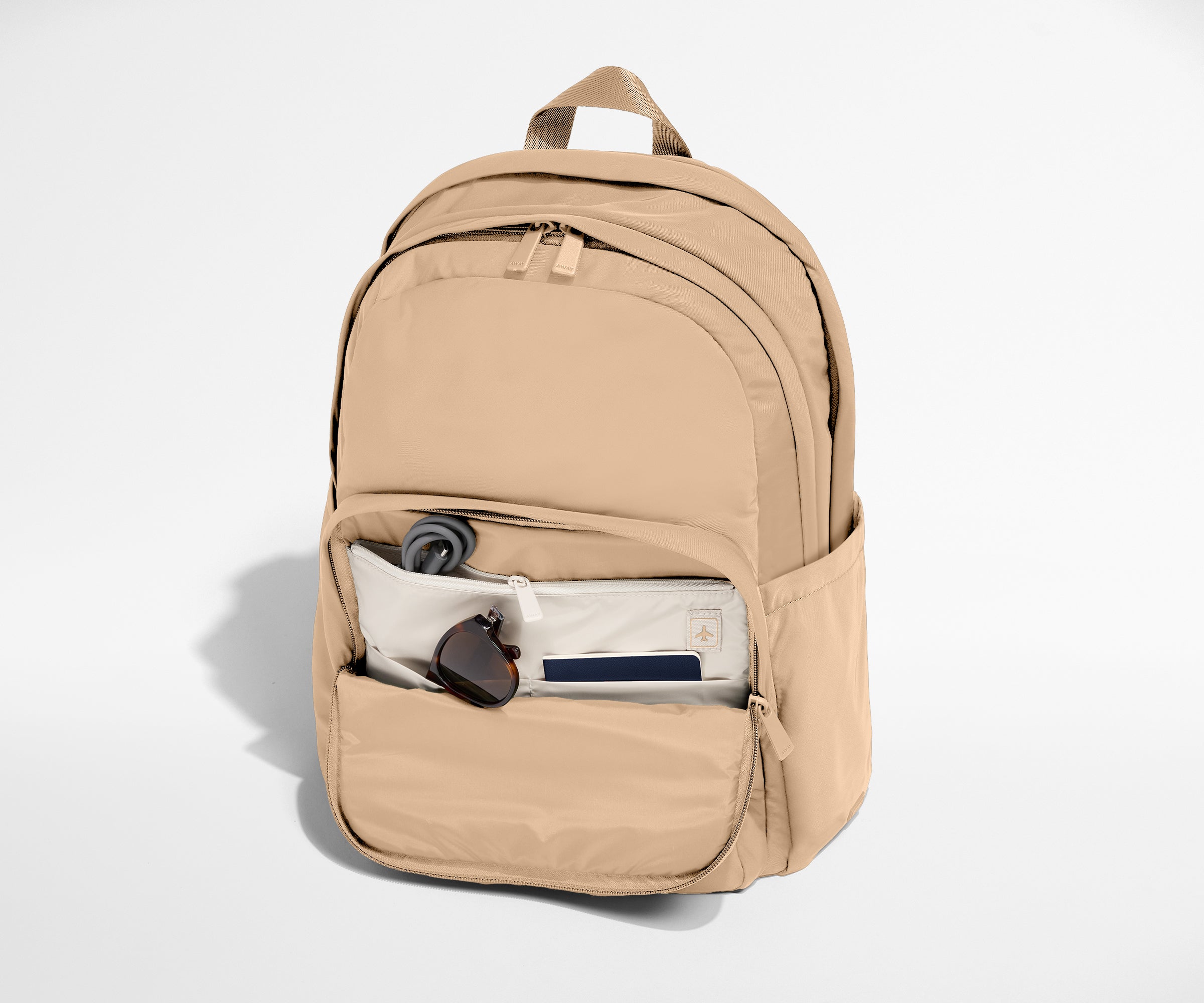 Away Large Featherlight Backpack in Camel Brown