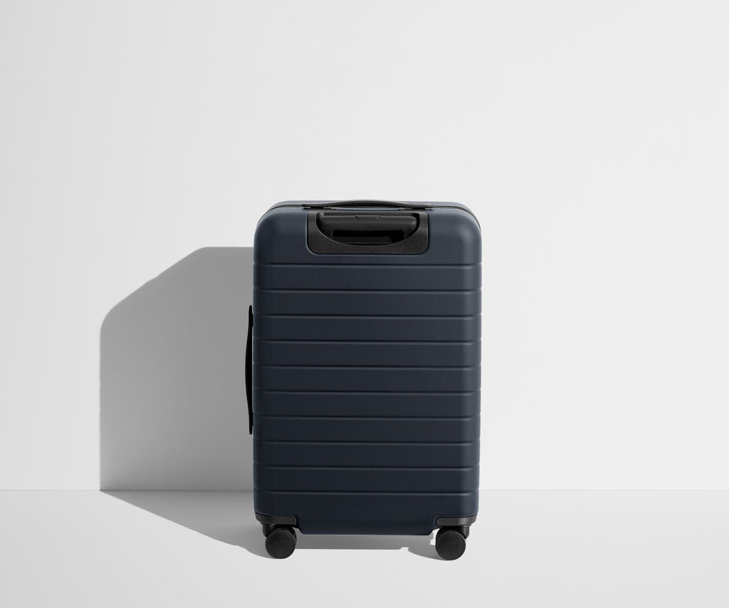 Away The Bigger Carry-On Flex Suitcase - Navy Blue