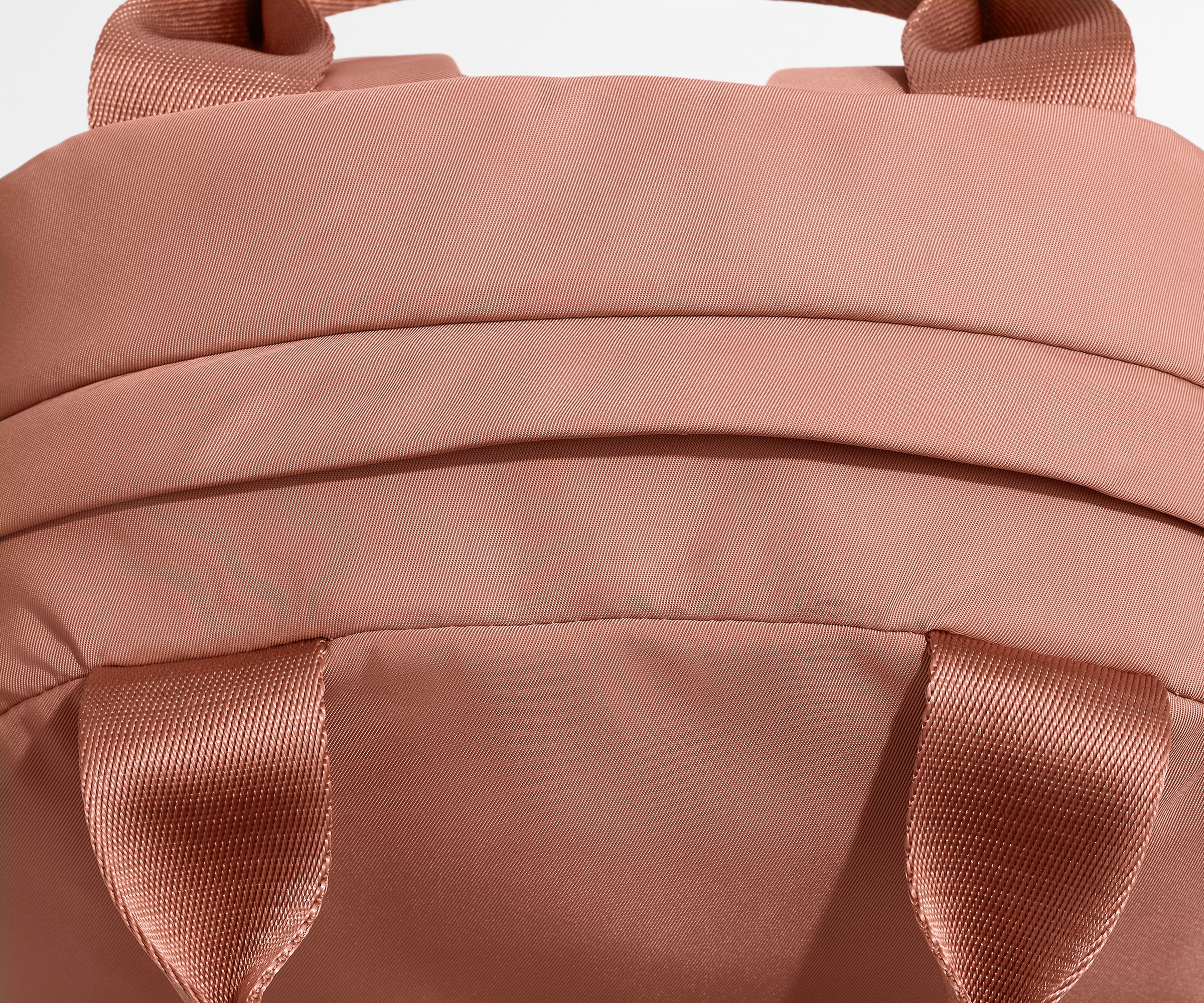 Away Featherlight Backpack in Clay Pink